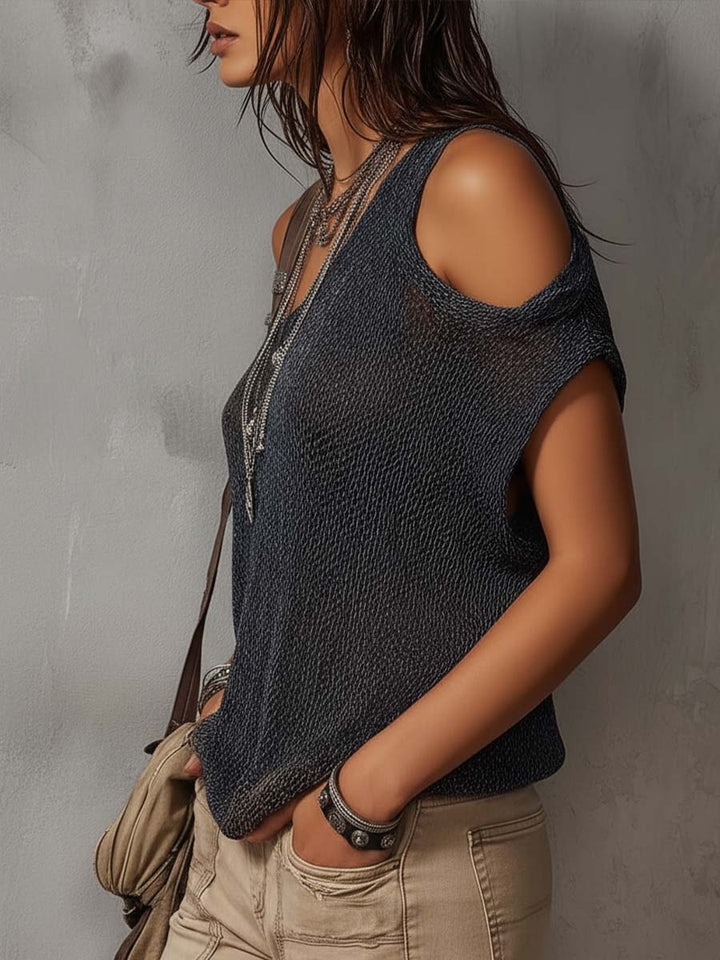 Irregular shoulder knit blouse detail close-up