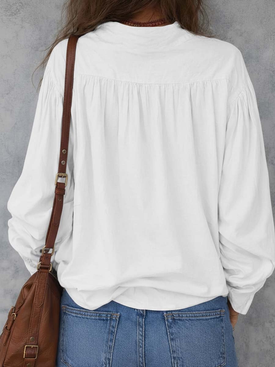 Ruffle cuffs blouse detail close-up