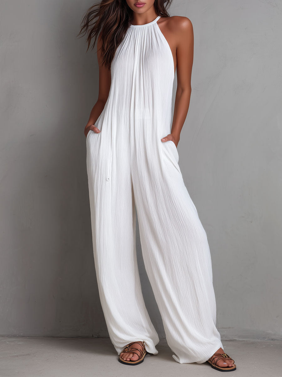 Resort white pleated halter wide-leg jumpsuit front view