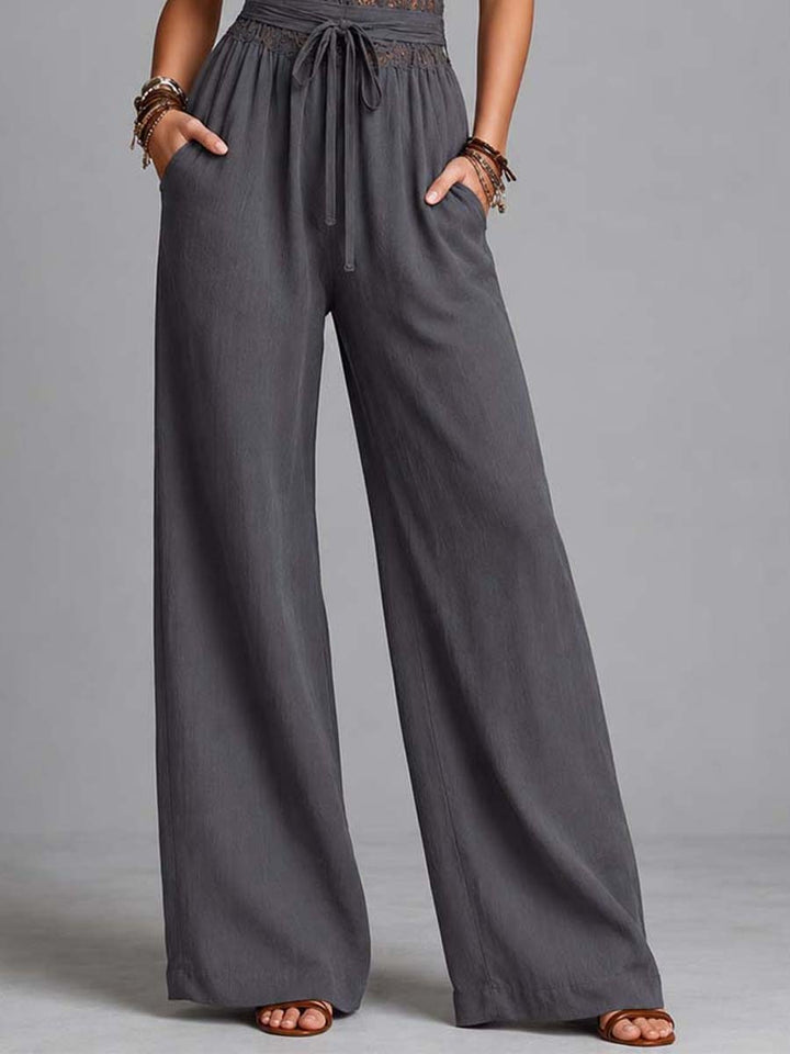 Charcoal lace halter wide-leg jumpsuit styled look