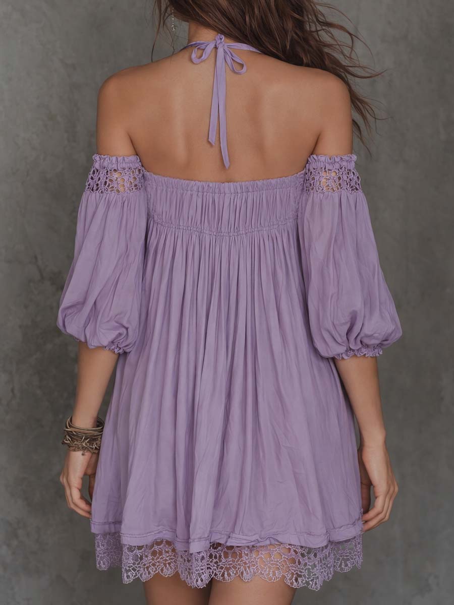 Off-shoulder embroidered mini dress detail close-up