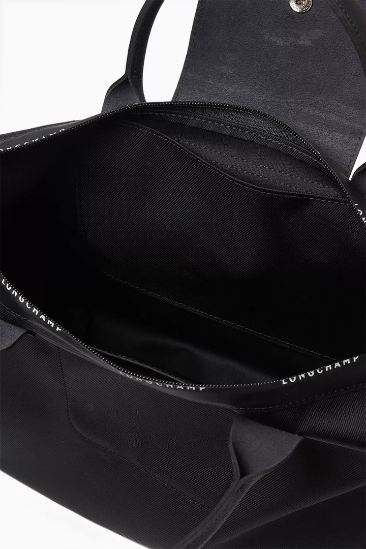 Longchamp Le Pliage Energy Small Black Crossbody Bag close-up silver hardware and zip closure detail