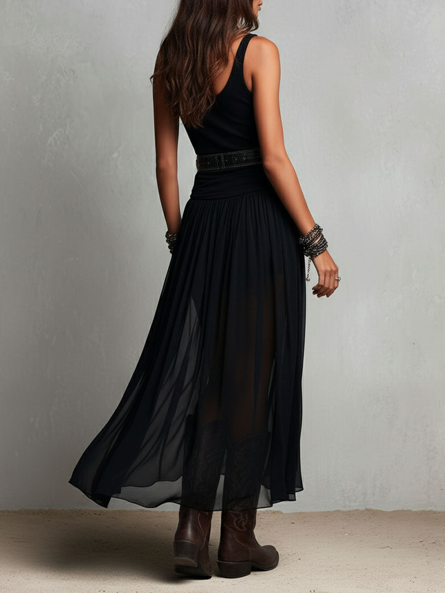 Black maxi dress sheer skirt detail close-up