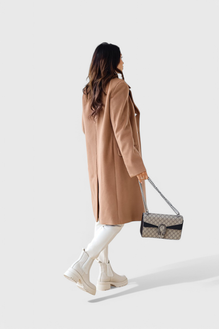 Yara fitted coat walking lifestyle fashion shot