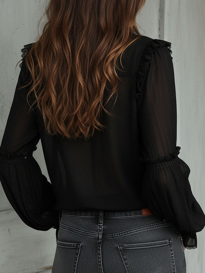 Black long sleeve ruffle blouse full length view