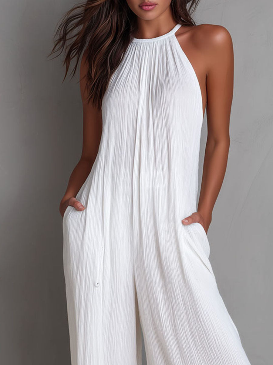 White pleated halter jumpsuit side view
