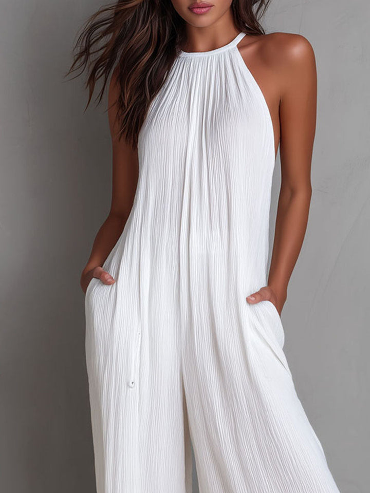 White pleated halter jumpsuit side view