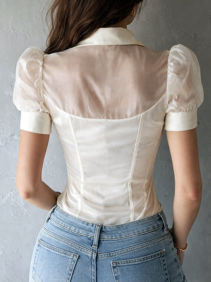 Satin puff sleeve blouse detail close-up