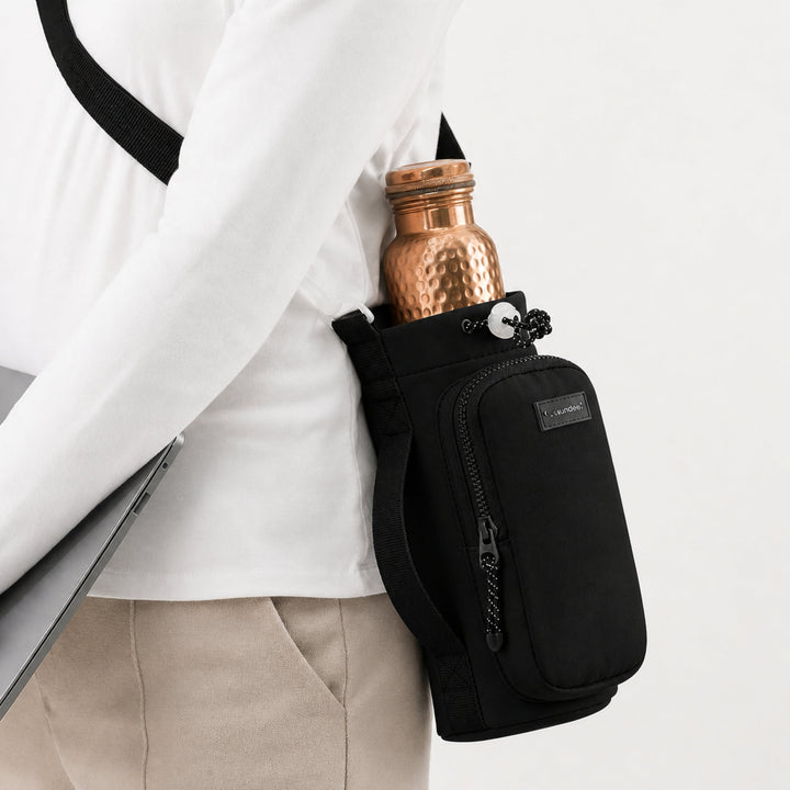 Copper water bottle carrier bag shown flat to display its lightweight minimalist design