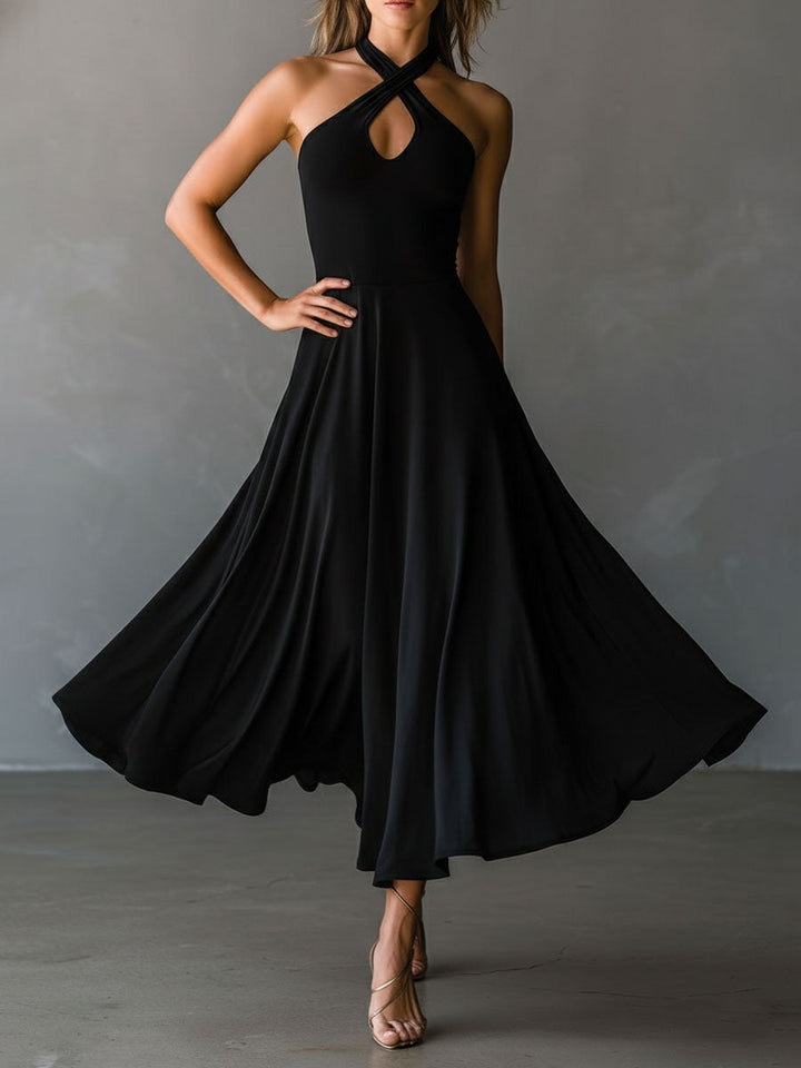 Black halter A-line midi dress side view