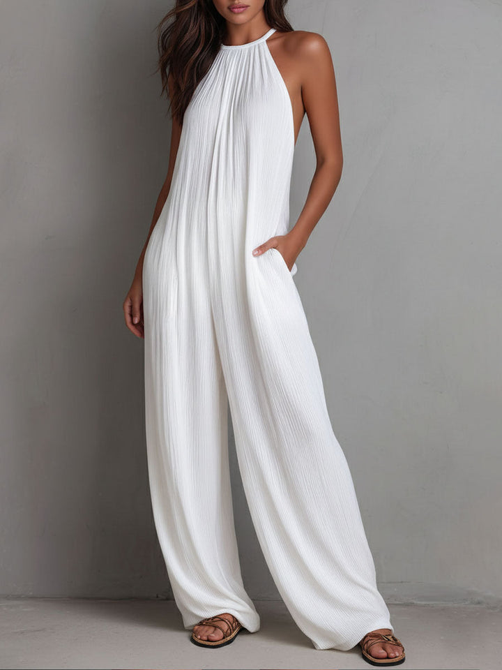 White pleated halter jumpsuit styled look