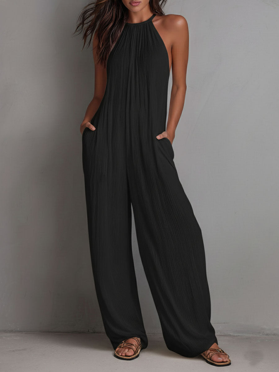 Pleated halter wide-leg jumpsuit detail close-up