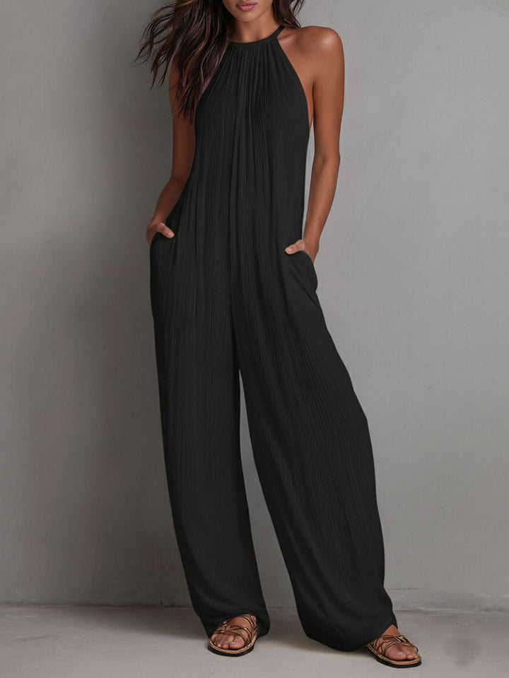 Pleated halter wide-leg jumpsuit detail close-up