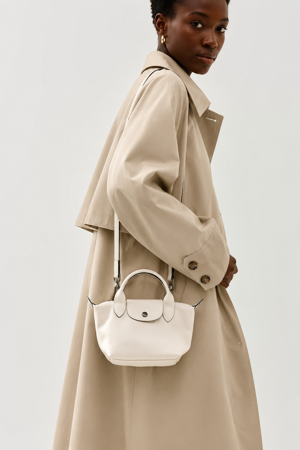 Longchamp Le Pliage Xtra XS Leather Bag 
Paper cream lifestyle shot