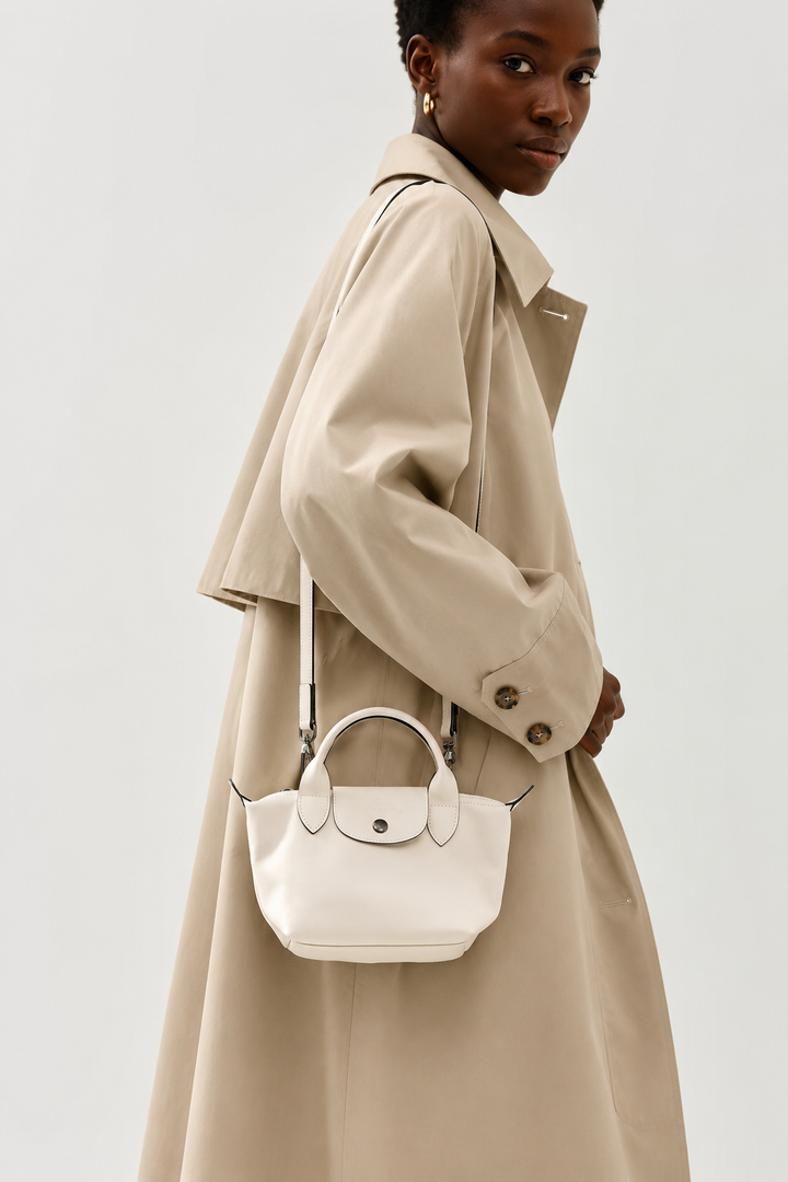 Longchamp Le Pliage Xtra XS Leather Bag 
Paper cream lifestyle shot