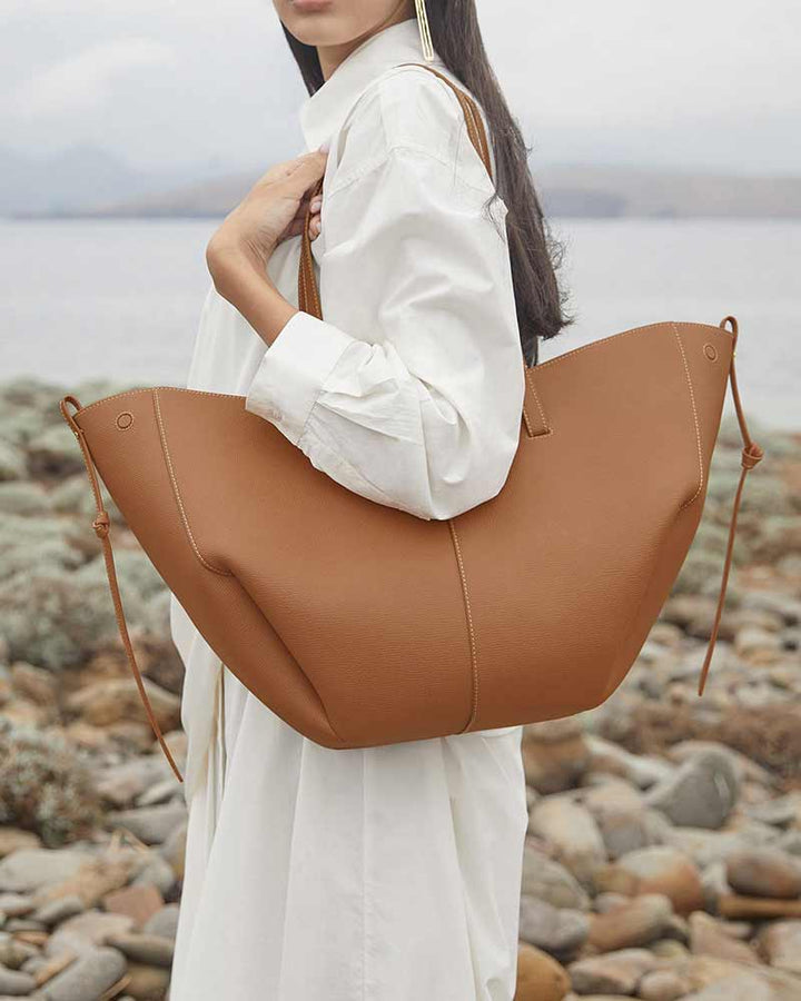 Cyme designer tote bag camel structured leather texture