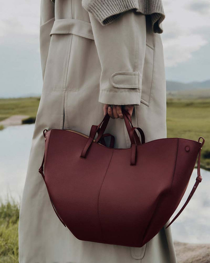 Cyme black cherry leather handbag wave texture detail close-up