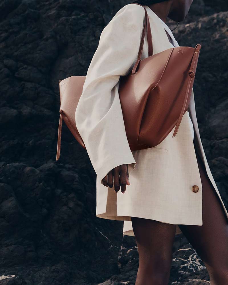 Cyme cognac leather tote bag three-quarter angle