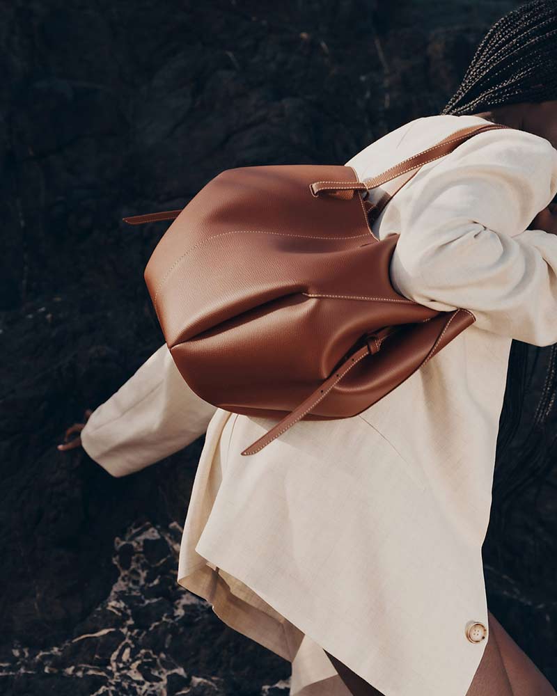 Cyme leather bag cognac wave fold silhouette back view