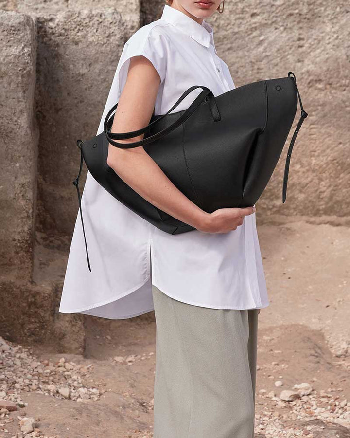 Cyme leather handbag black back view wave silhouette