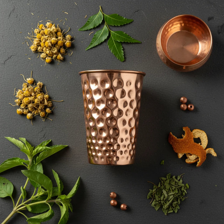 Copper Heritage glass tumbler shown in a flat-lay product photo highlighting its dimpled texture.