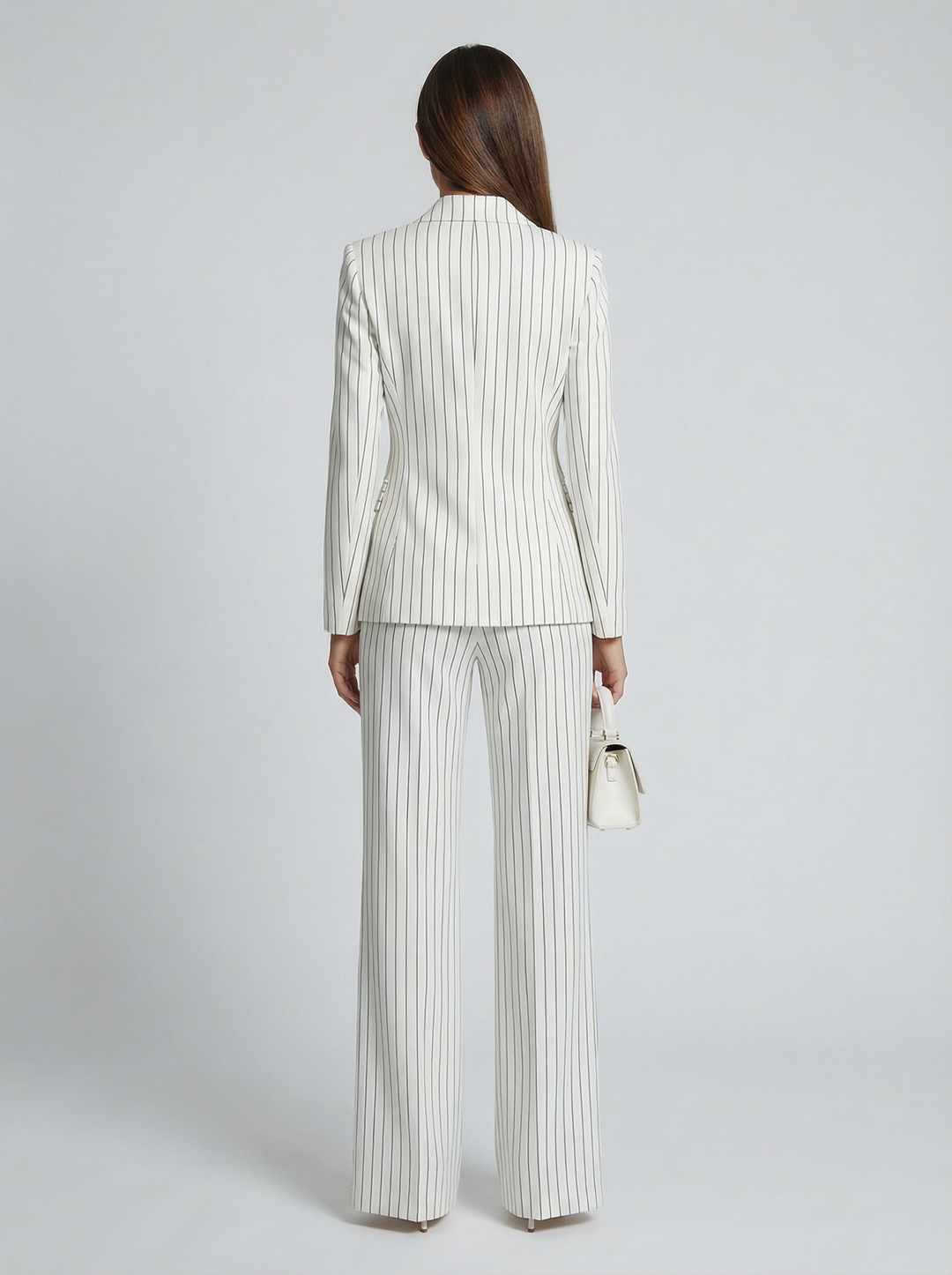Elegant diplomatic suit women – back view