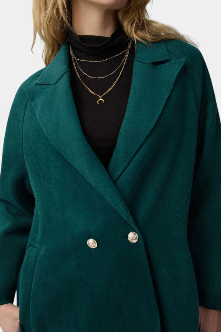 Isabella coat crossed lapel detail close-up
