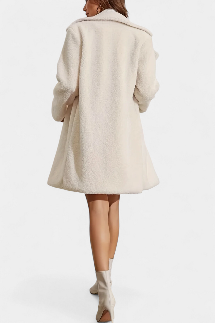 Lyra women's long coat walking lifestyle outdoor shot