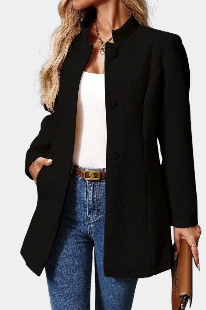 Lyana collar and sleeve cuff detail close-up